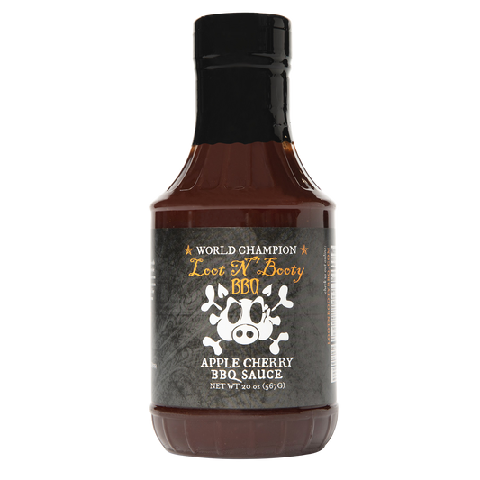 Bottle of World Champion Beef 'N' Booty Apple Cherry Sauce on a white background